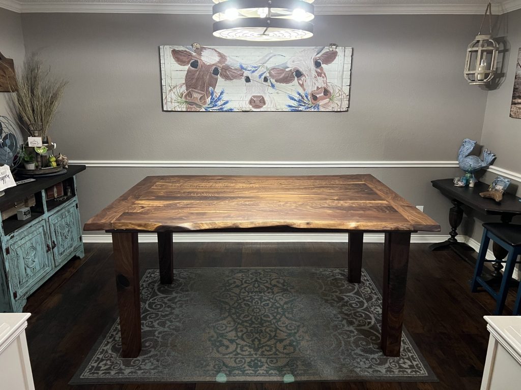Live-edge walnut dining table in a client dining room