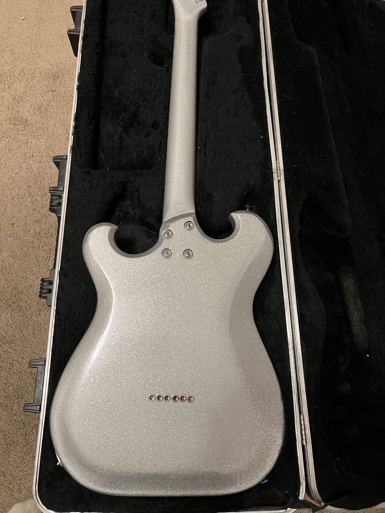 Back of the silver sparkle electric guitar