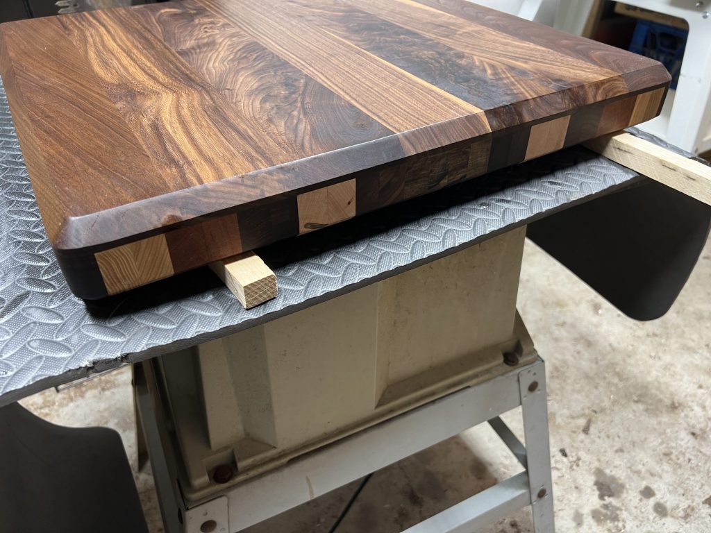 Walnut cutting board with end-grain edge detail