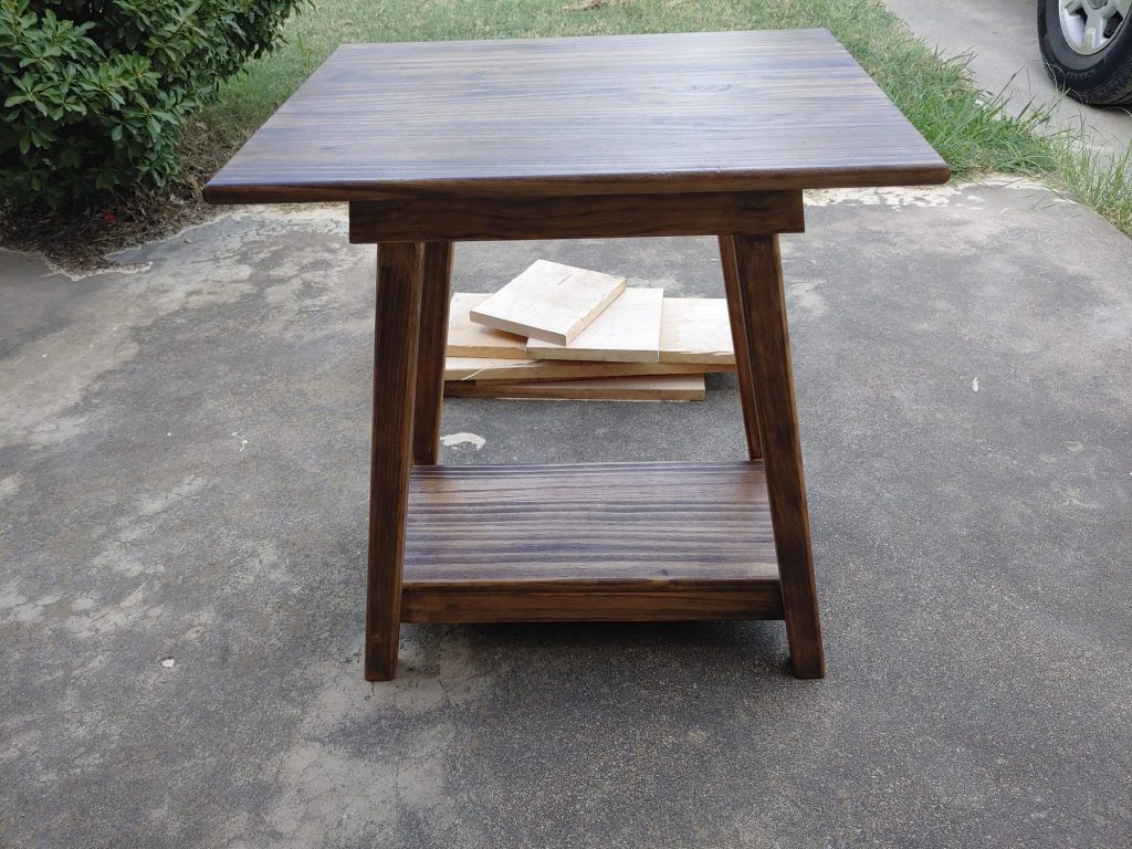 Walnut end table with lower shelf